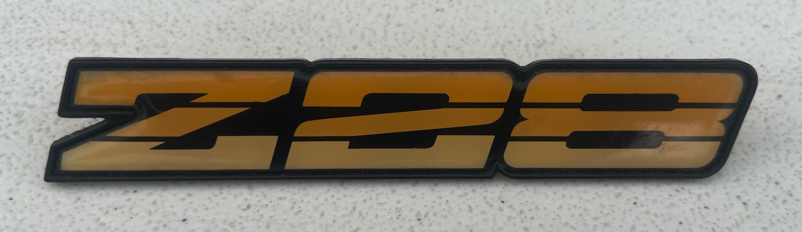 82-92 Camaro Z28 dash badge (yellow)