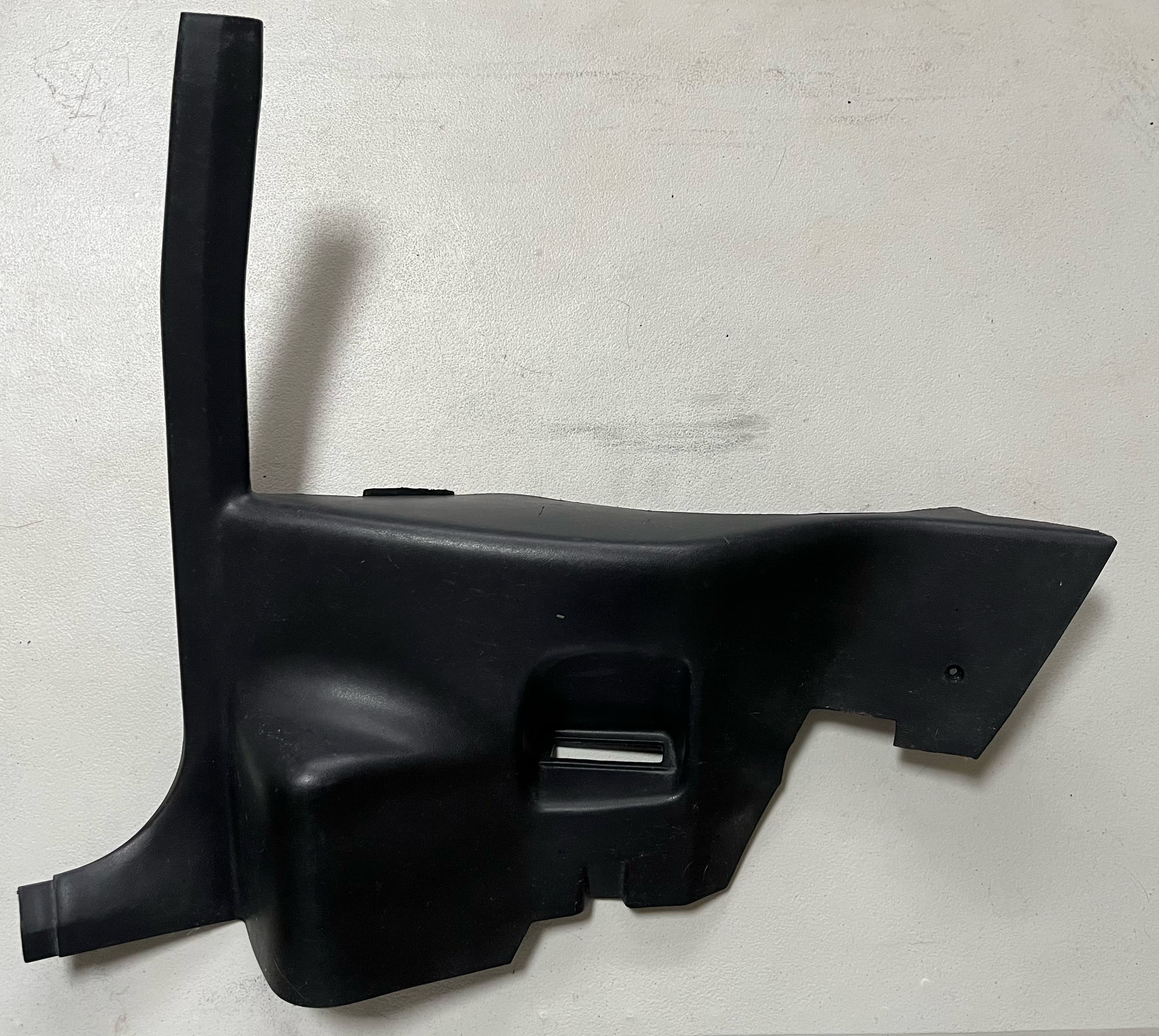 82-88 Camaro/Firebird black rear lower interior trim piece (Passenger)
