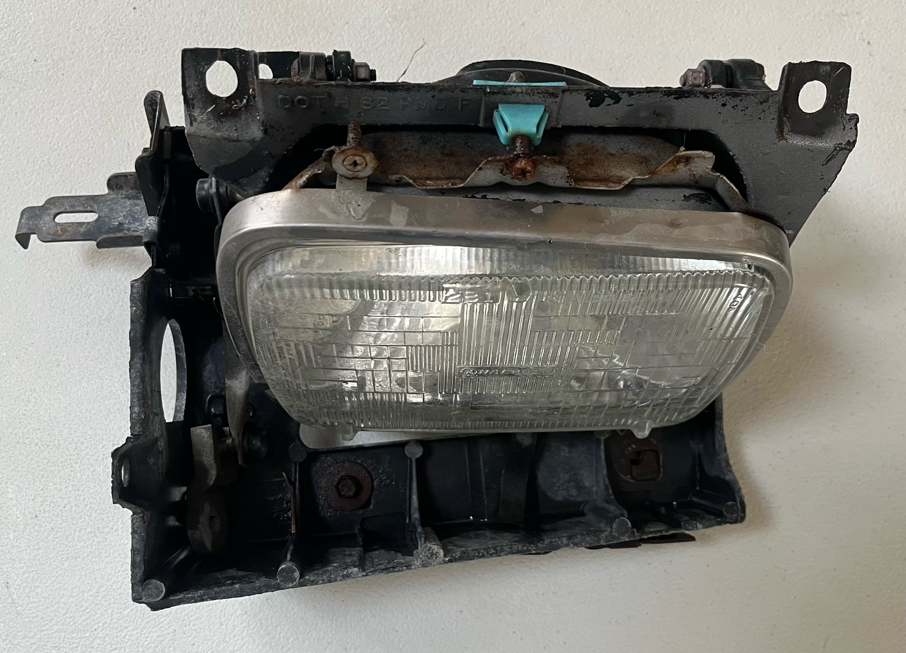 82-90 Firebird driver's headlight bracket