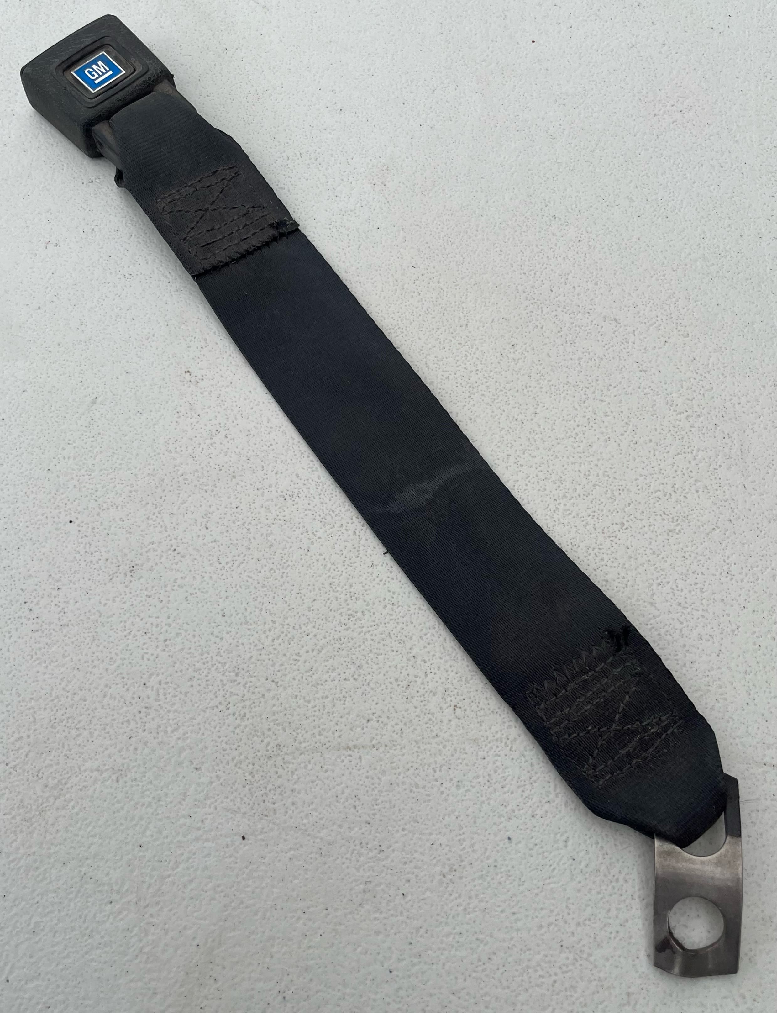 82-92 Camaro/Firebird charcoal rear seat belt receiver (82-83 style)