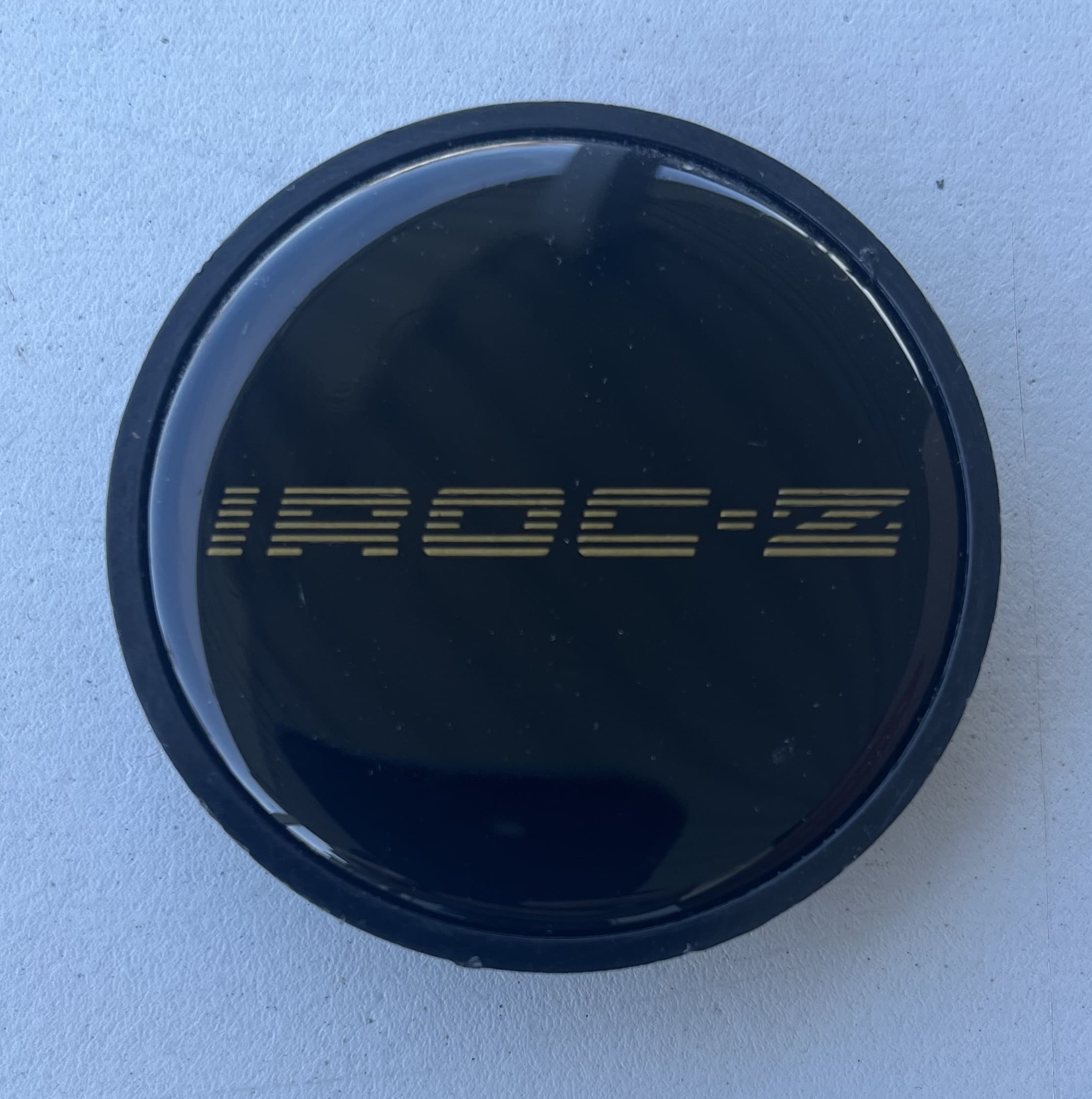 85-87 IROC center cap (gold)